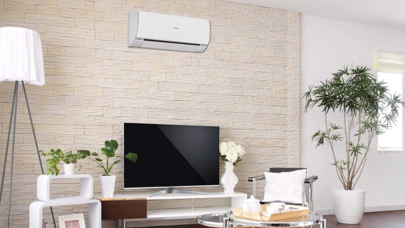 Panasonic Heat Pump above TV class=
