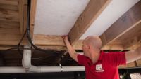 Mammoth Underfloor Insulation segments installer